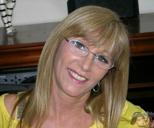 Genre old milf with glasses..